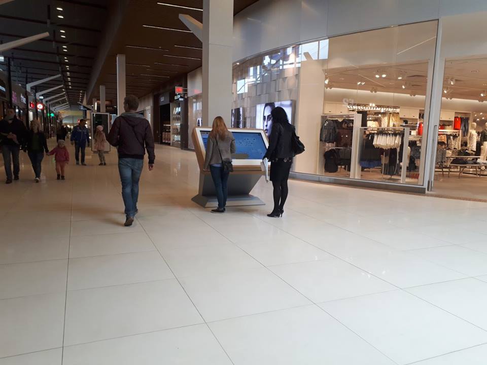 wayfinding kiosk being used in Estonian largest shopping mall